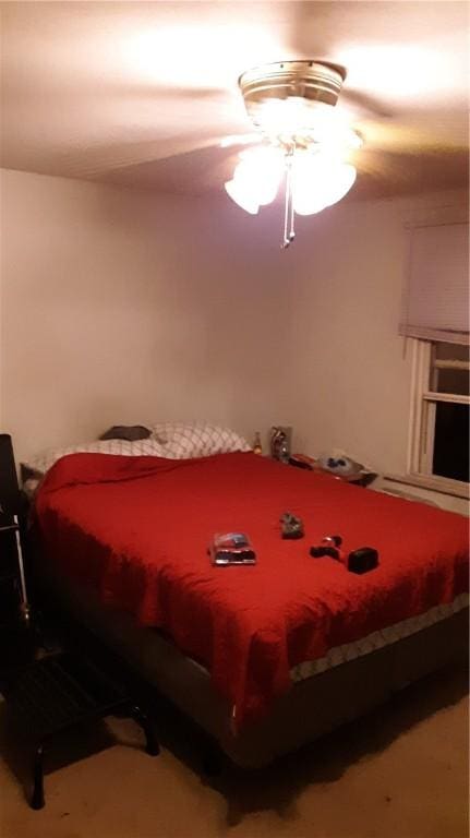 bedroom with carpet and ceiling fan