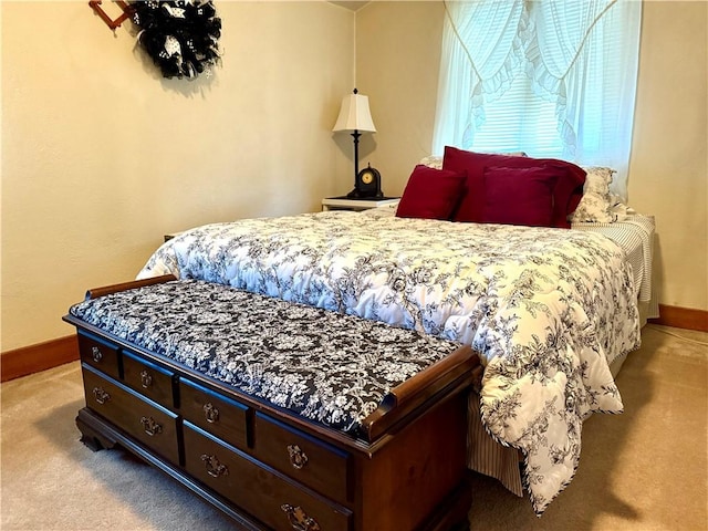 bedroom with light carpet