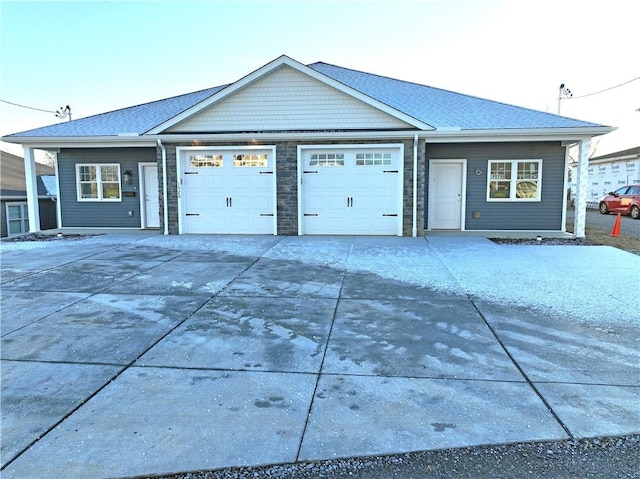 single story home featuring a garage