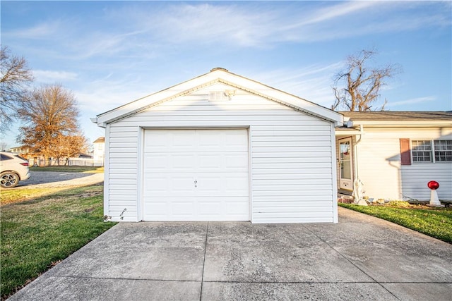 garage with a yard