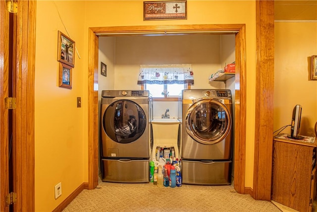 washroom featuring washing machine and dryer