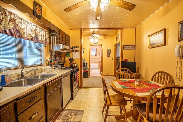 kitchen with ceiling fan, sink, and appliances with stainless steel finishes