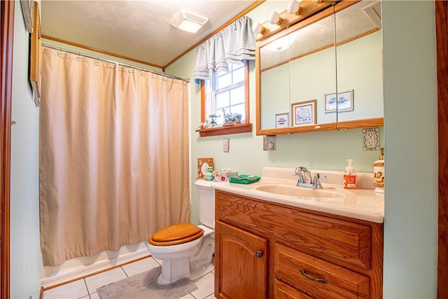 full bathroom with tile patterned flooring, shower / bath combo, vanity, and toilet