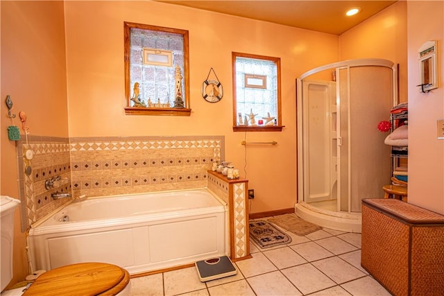 bathroom with tile patterned flooring and plus walk in shower