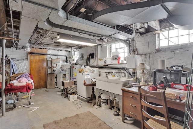 basement with washer / dryer and sink