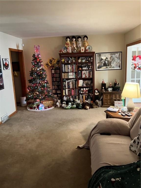 living area featuring carpet flooring