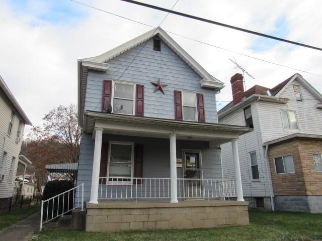 view of property featuring a porch