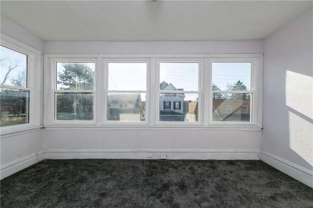 unfurnished sunroom with a healthy amount of sunlight