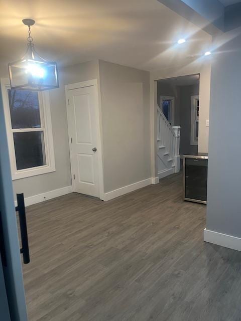 empty room featuring dark hardwood / wood-style floors