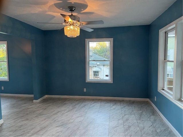 empty room featuring ceiling fan