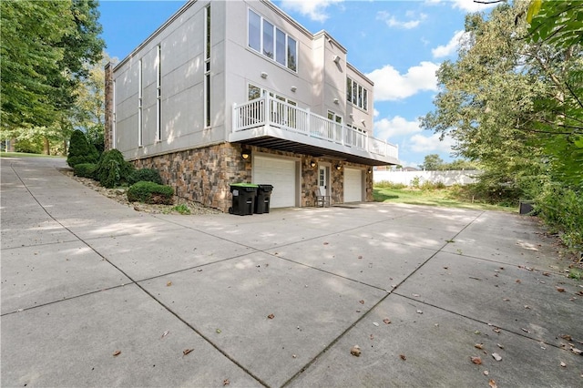 view of property exterior featuring a garage