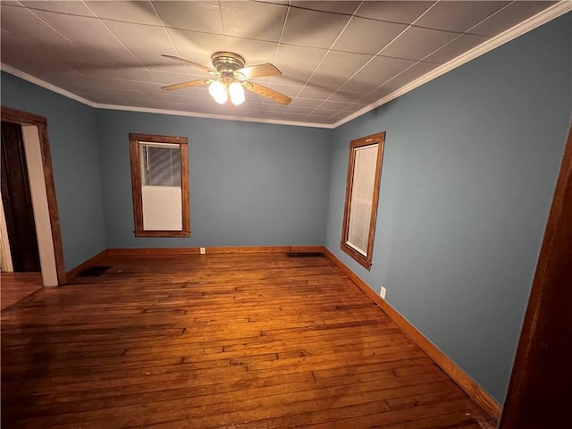 unfurnished bedroom featuring ceiling fan, hardwood / wood-style floors, and ornamental molding