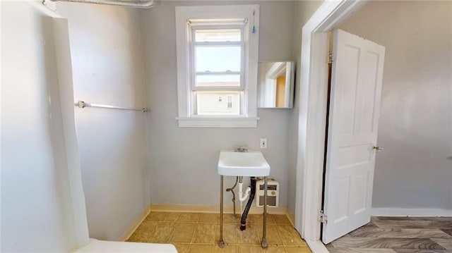 bathroom with tile patterned flooring