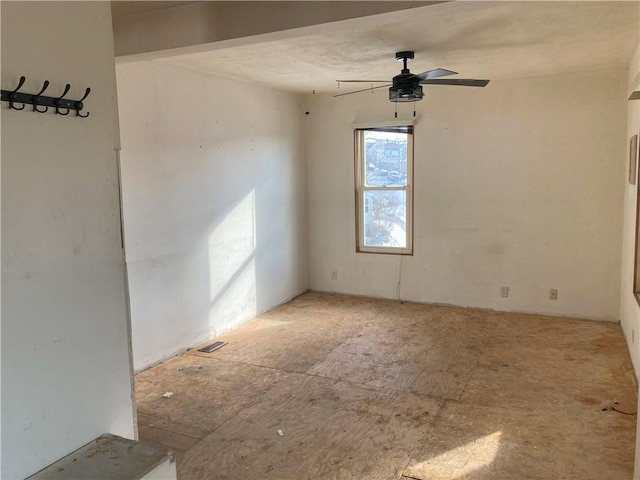 spare room featuring ceiling fan