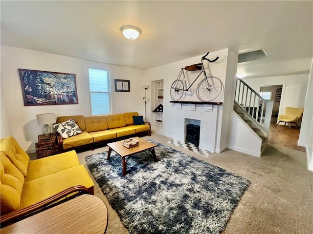 carpeted living room with a fireplace