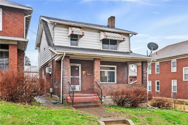 front facade with a front yard