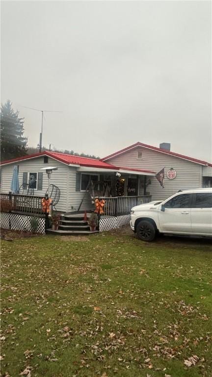 view of front of home with a front yard