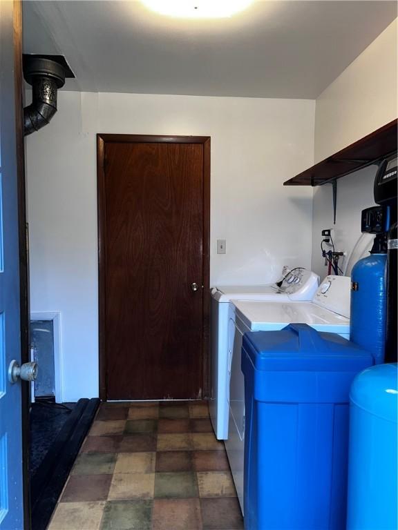 laundry room with washer and dryer