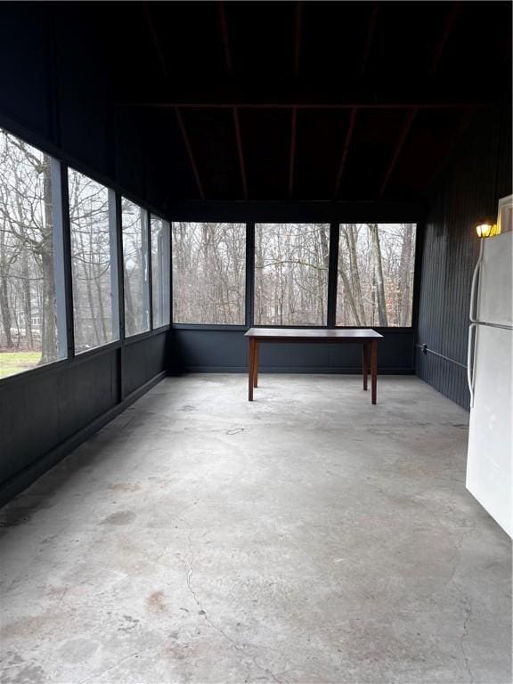 unfurnished sunroom with a wealth of natural light