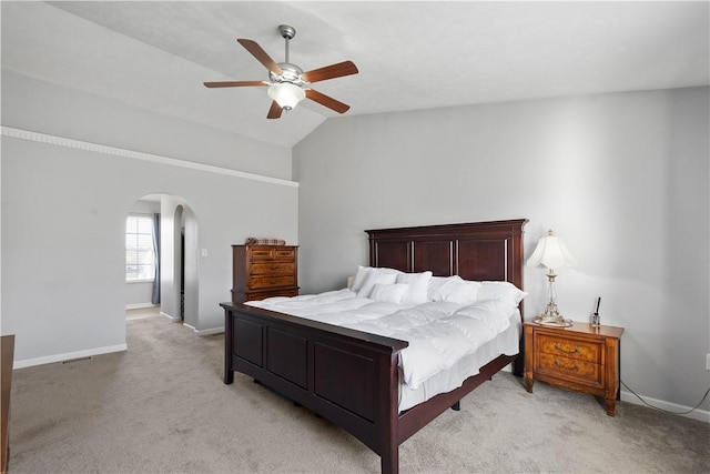 carpeted bedroom featuring ceiling fan and lofted ceiling