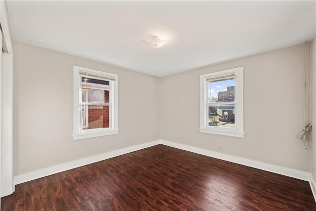 unfurnished room featuring hardwood / wood-style floors