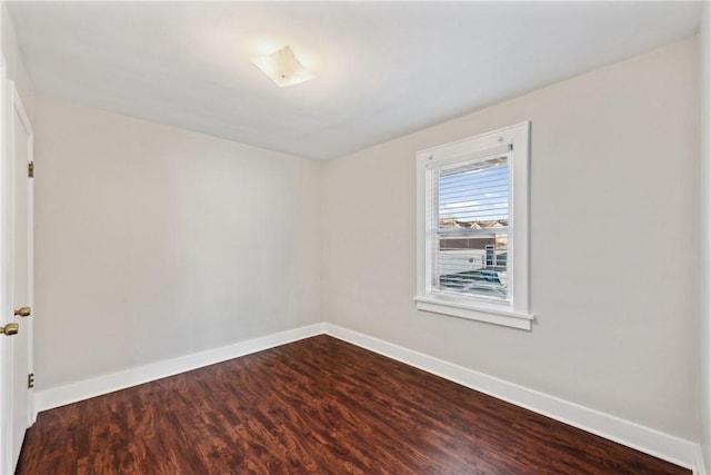 empty room featuring hardwood / wood-style flooring