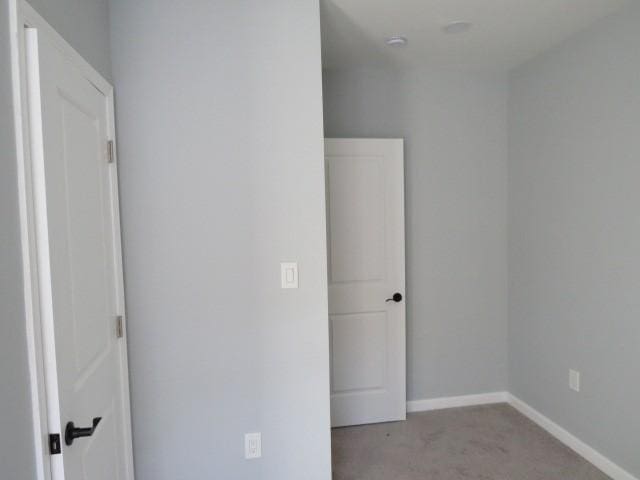 unfurnished bedroom featuring baseboards