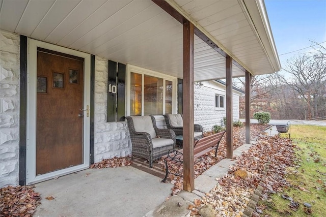 doorway to property with a porch