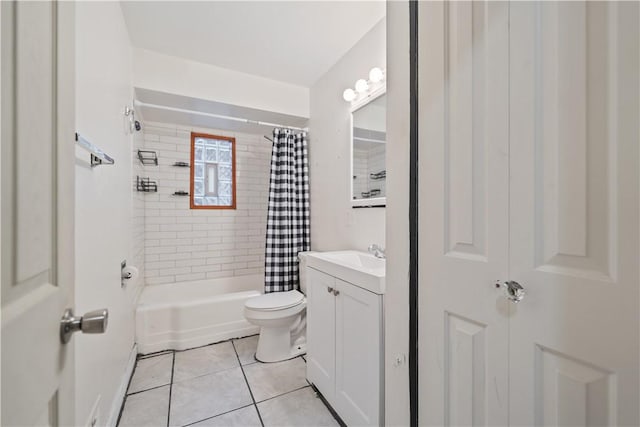 full bathroom featuring tile patterned floors, vanity, toilet, and shower / tub combo with curtain