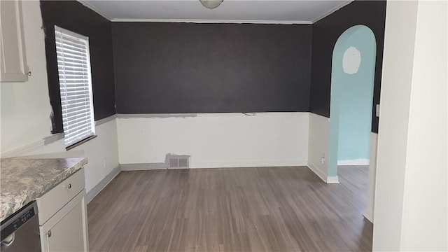 1802 Alcoa Dr, Arnold, PA 15068 - unfurnished dining area featuring wood finished floors, ornamental molding, and arched walkways