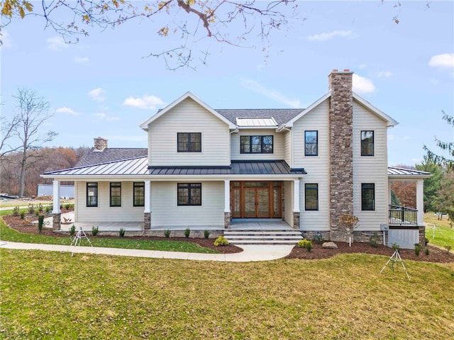 view of front of house featuring a porch and a front yard