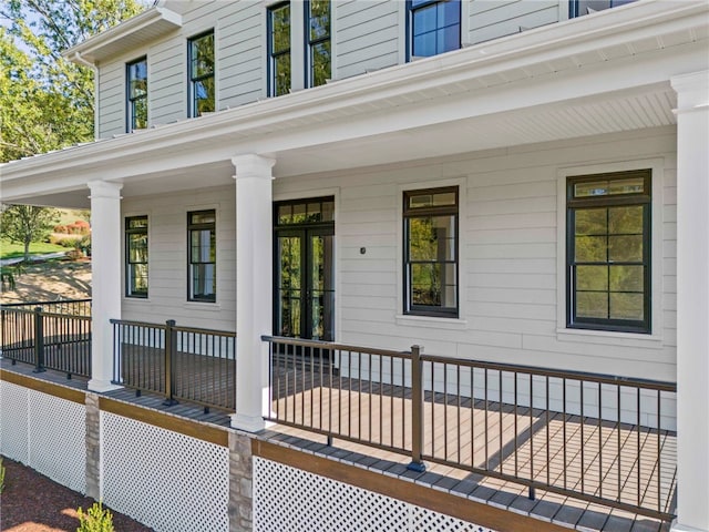 property entrance featuring covered porch