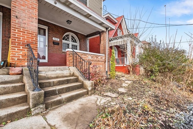 entrance to property with a porch