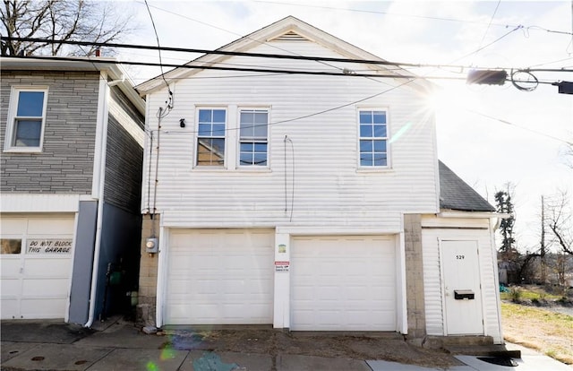 view of home's exterior with a garage