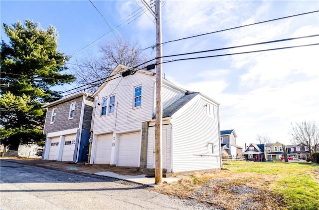 view of home's exterior featuring a garage