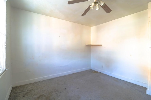 carpeted empty room with ceiling fan