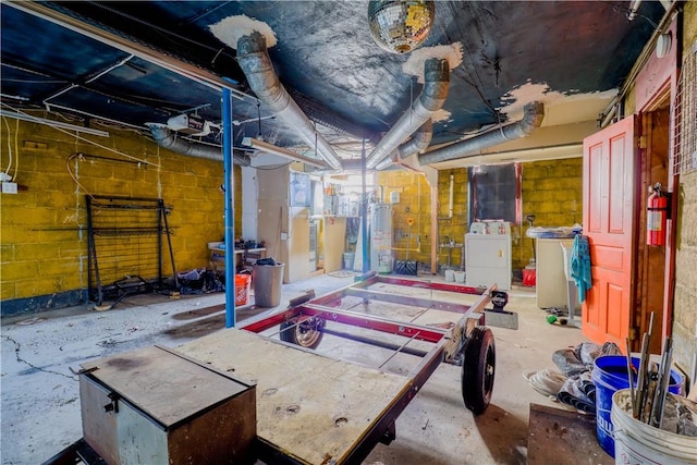 interior space featuring independent washer and dryer and water heater