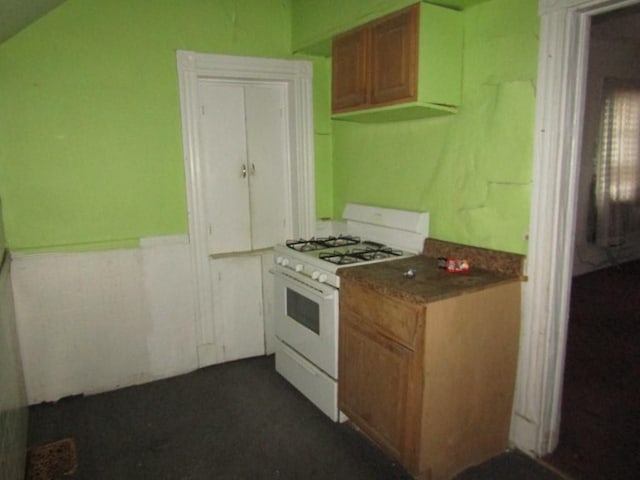 kitchen with white gas range oven