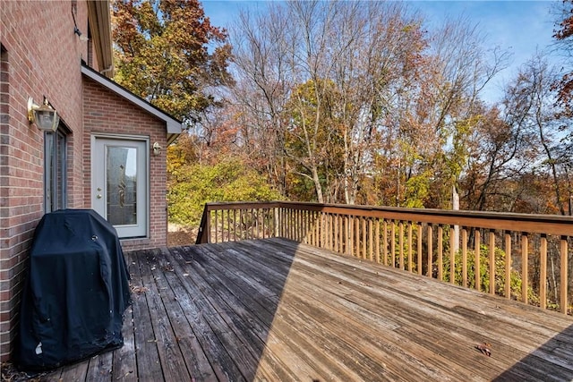 wooden deck with area for grilling