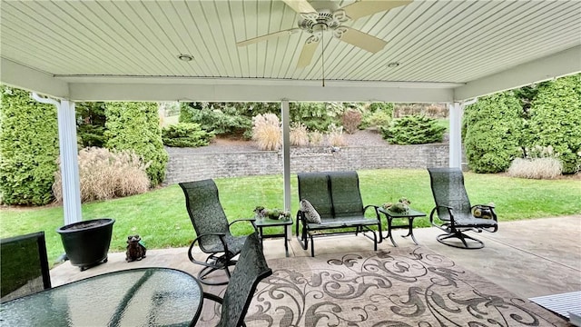 view of patio / terrace featuring ceiling fan