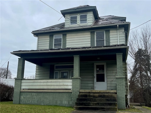 view of property featuring a porch