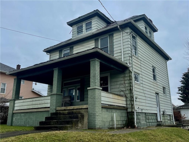 view of home's exterior with covered porch