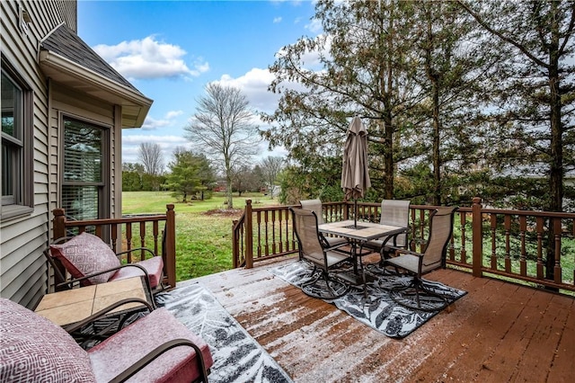 deck featuring a lawn