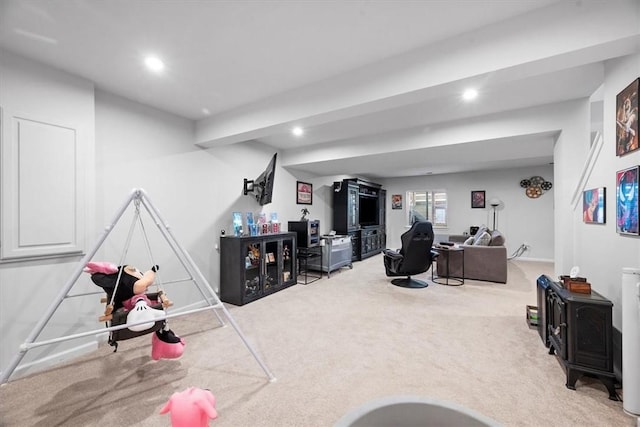 game room featuring beam ceiling and carpet floors