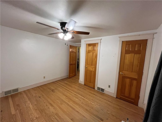 unfurnished bedroom with light hardwood / wood-style flooring and ceiling fan