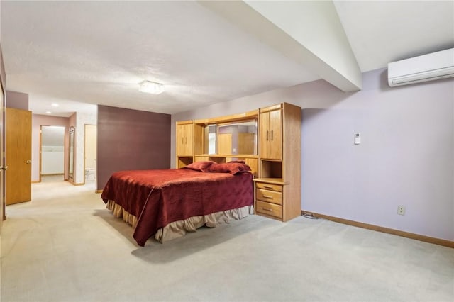 carpeted bedroom with a wall mounted air conditioner