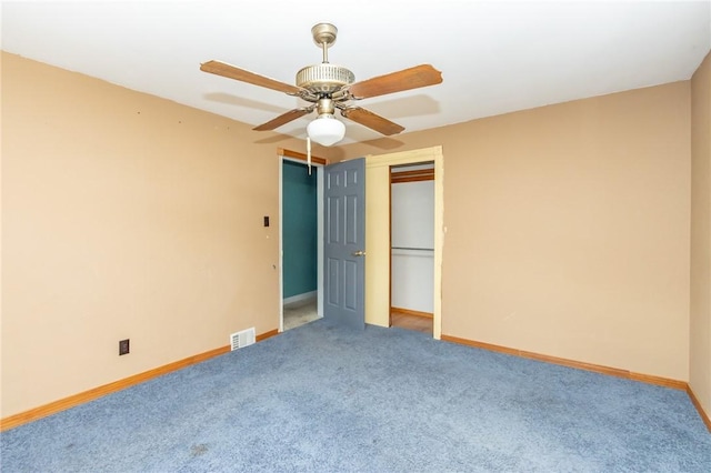 unfurnished bedroom featuring carpet flooring, a closet, and ceiling fan