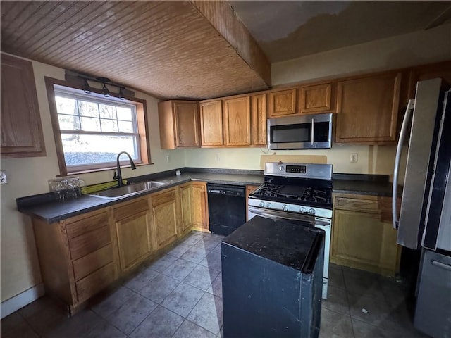 kitchen featuring light tile patterned floors, sink, and appliances with stainless steel finishes