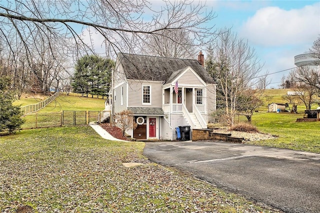 view of front of home with a front yard