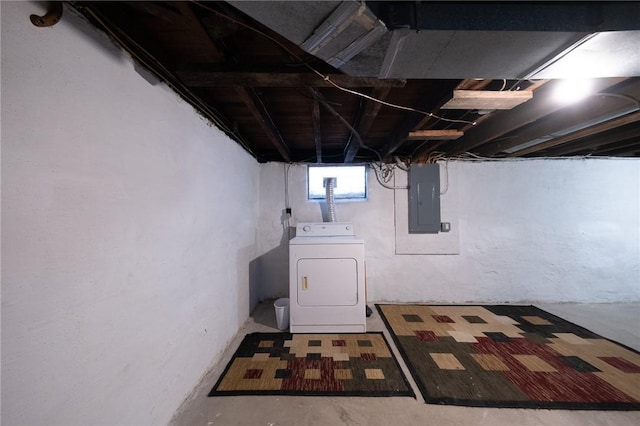 basement with electric panel and washer / clothes dryer